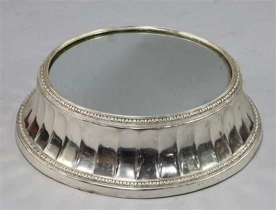 A 20th century Elkington silver plate on copper mirrored cake plateau, 22.25in.